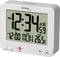 Electronic clock shows 12:34, Monday, 26.5 degrees Celsius.