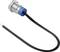 Metal sensor with a blue cap and black cable, used in industrial applications for object detection.