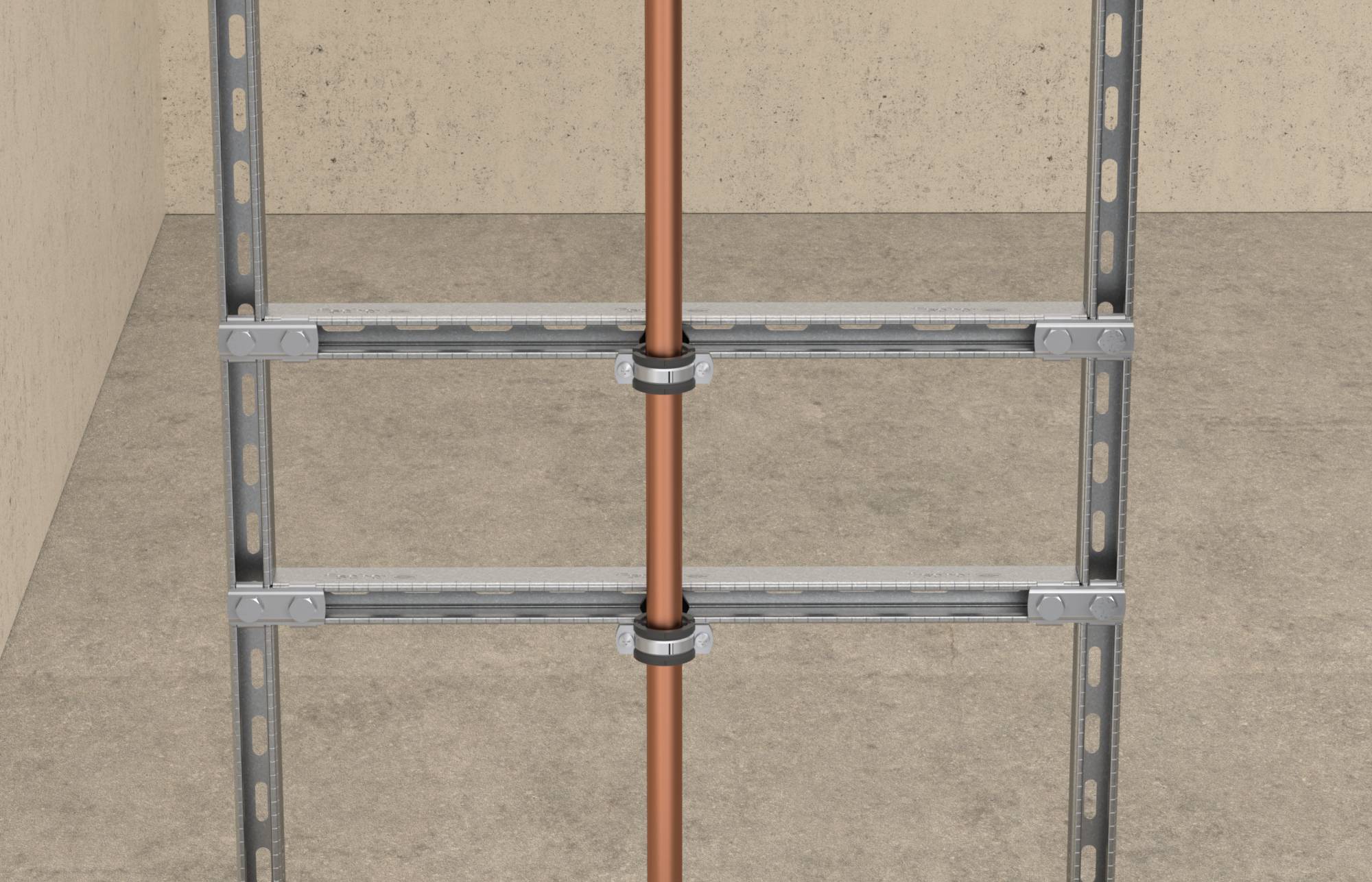Metal support frame with a central copper pipe held by two clamps against a concrete wall and floor.