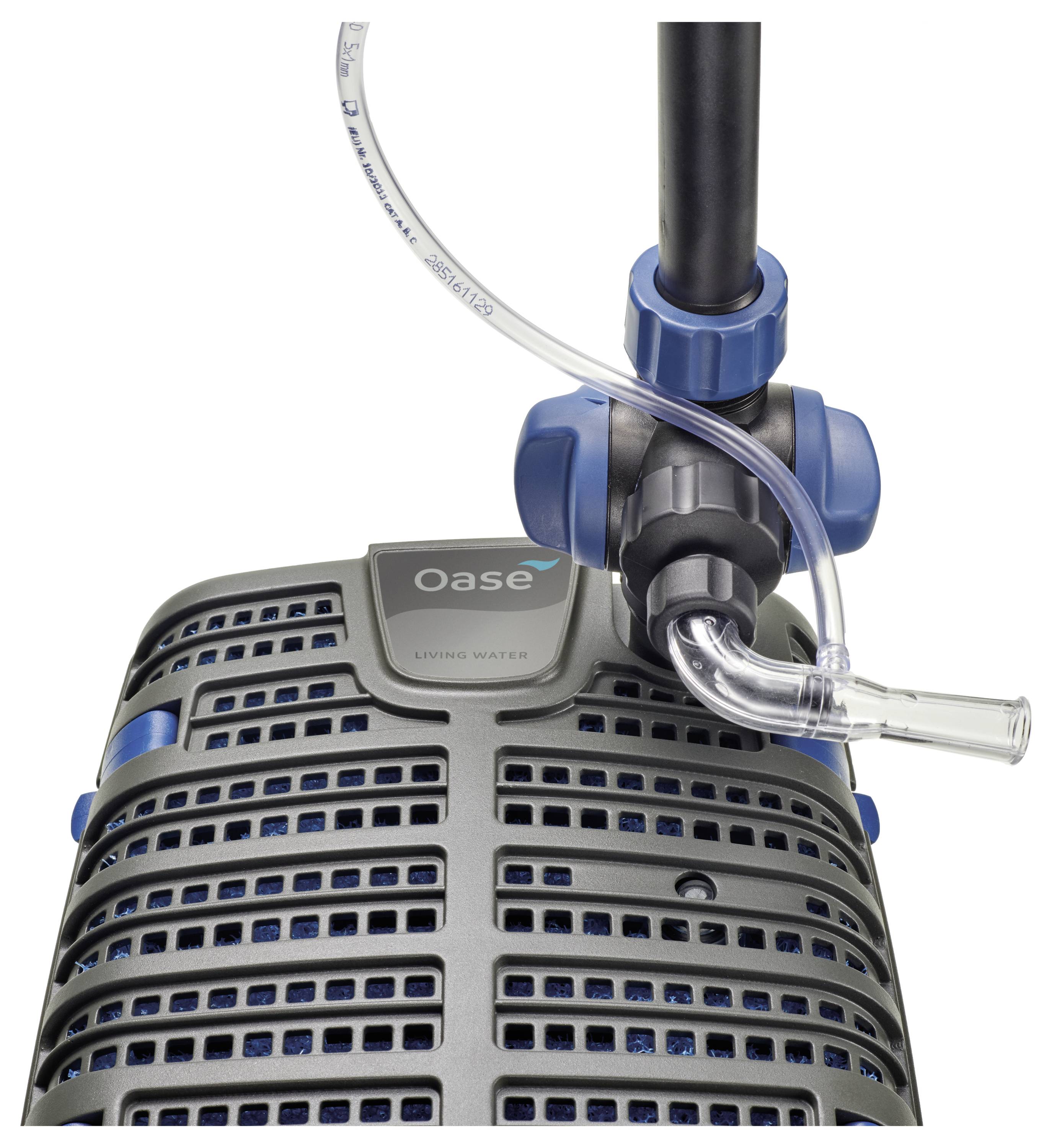 A close-up of an aquarium water pump with a protective casing and connected hose, featuring the 'Oase Living Water' brand label.