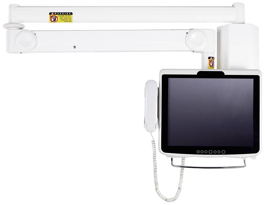 A white medical monitor mounted on the wall with a telephone handset, connected via an articulated arm system.