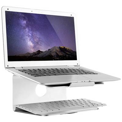 A laptop on a stand displays an image of a star-filled sky over a mountain on the screen. A keyboard is positioned beneath it.