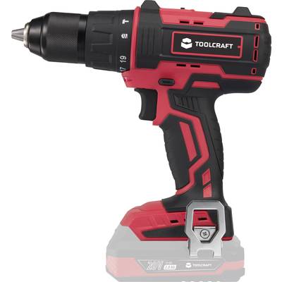 Cordless drill in red and black with an ergonomic handle and integrated tool holder. 'Toolcraft' brand, 20V power.