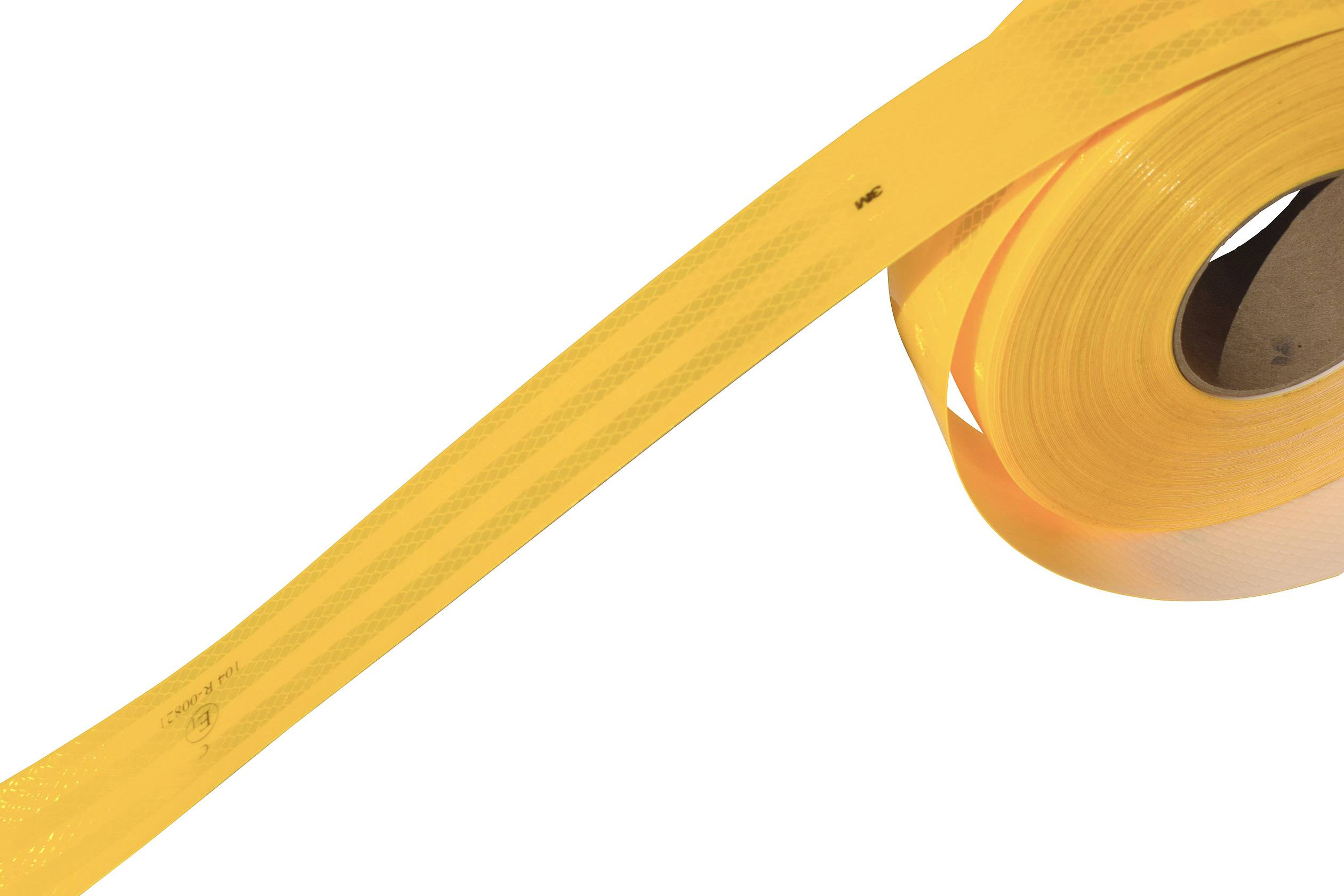 Yellow barrier tape unrolls from a reel. It is often used to mark off restricted areas or construction sites.