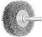 Wire brush attachment on a drill, used for cleaning or removing rust from metal surfaces.