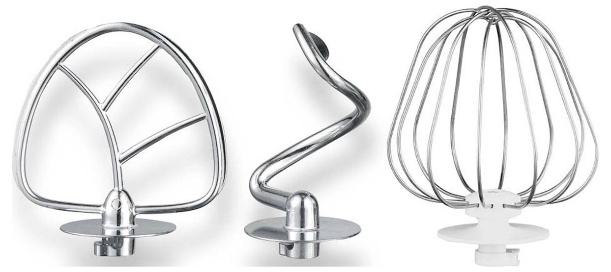 Three mixing attachments for stand mixers: dough hook, beater and whisk, manufactured from metal, standing side by side.