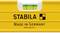 Spirit level with a yellow casing and the inscription 'Stabila Made in Germany', indicating horizontal alignment.