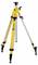 A sturdy yellow and silver tripod with adjustable legs, designed for stability in various conditions, displaying a brand logo.