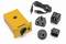 Yellow electronic device with cable, four different plugs and a USB adapter. Suitable for international use.