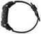 Black outdoor sports watch with robust design and silicone strap, photographed from the side against a light background.