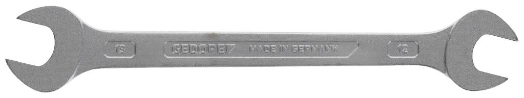 A silver double-ended spanner with sizes '6' and '7', with 'GEDORE' and 'MADE IN GERMANY' printed on the handle.