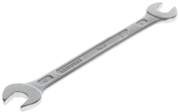 A silver spanner with an open end, lying sideways. Size 10 on the left, size 13 on the right.