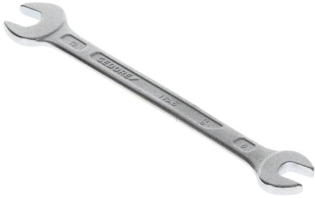 A silver combination spanner with sizes '8' and '10' at the ends. The tool is lying on a white surface.