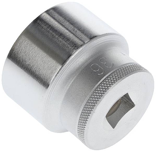 A silver metal part with a ridged surface and a rectangular opening. The number '36' is embossed on it.