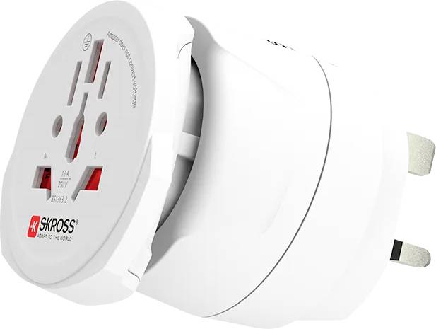White travel adapter by SKROSS with multiple plug types, suitable for international power sockets.