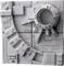 Grey square plate with distributed rectangular and circular structures and cable patterns, reminiscent of a futuristic machine component.