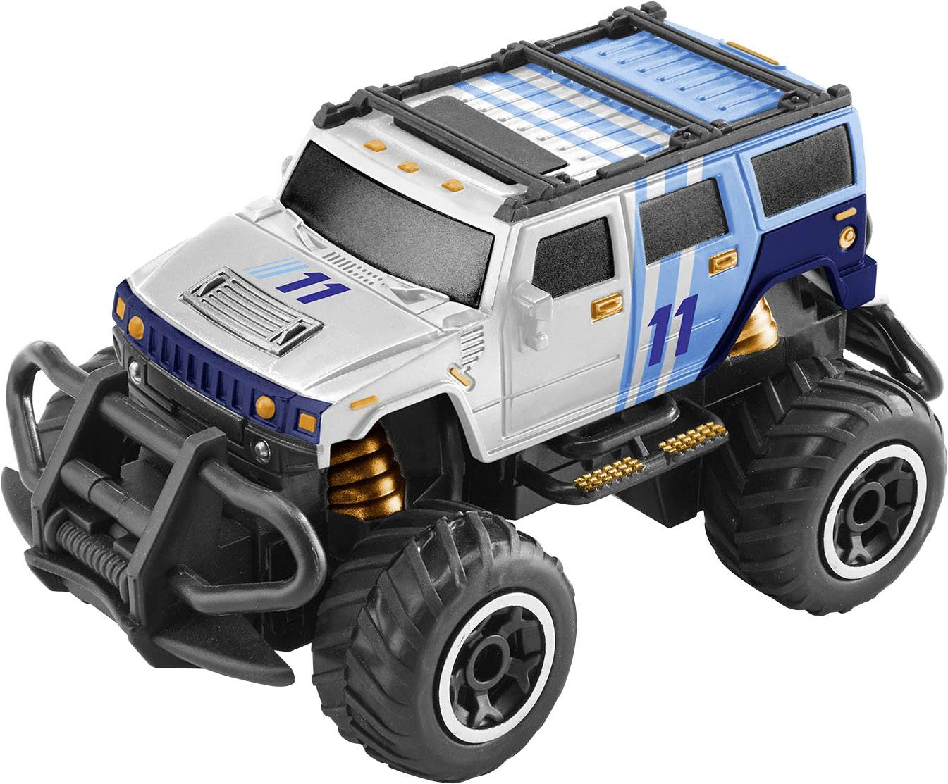 Toy monster truck in blue and white with the number '11' on the side, pronounced suspension and large tyres on a table.