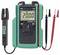 Digital multimeter with green protective case, probes, and clamp sensor; display reads 200.0 and dial is centered on the front panel.