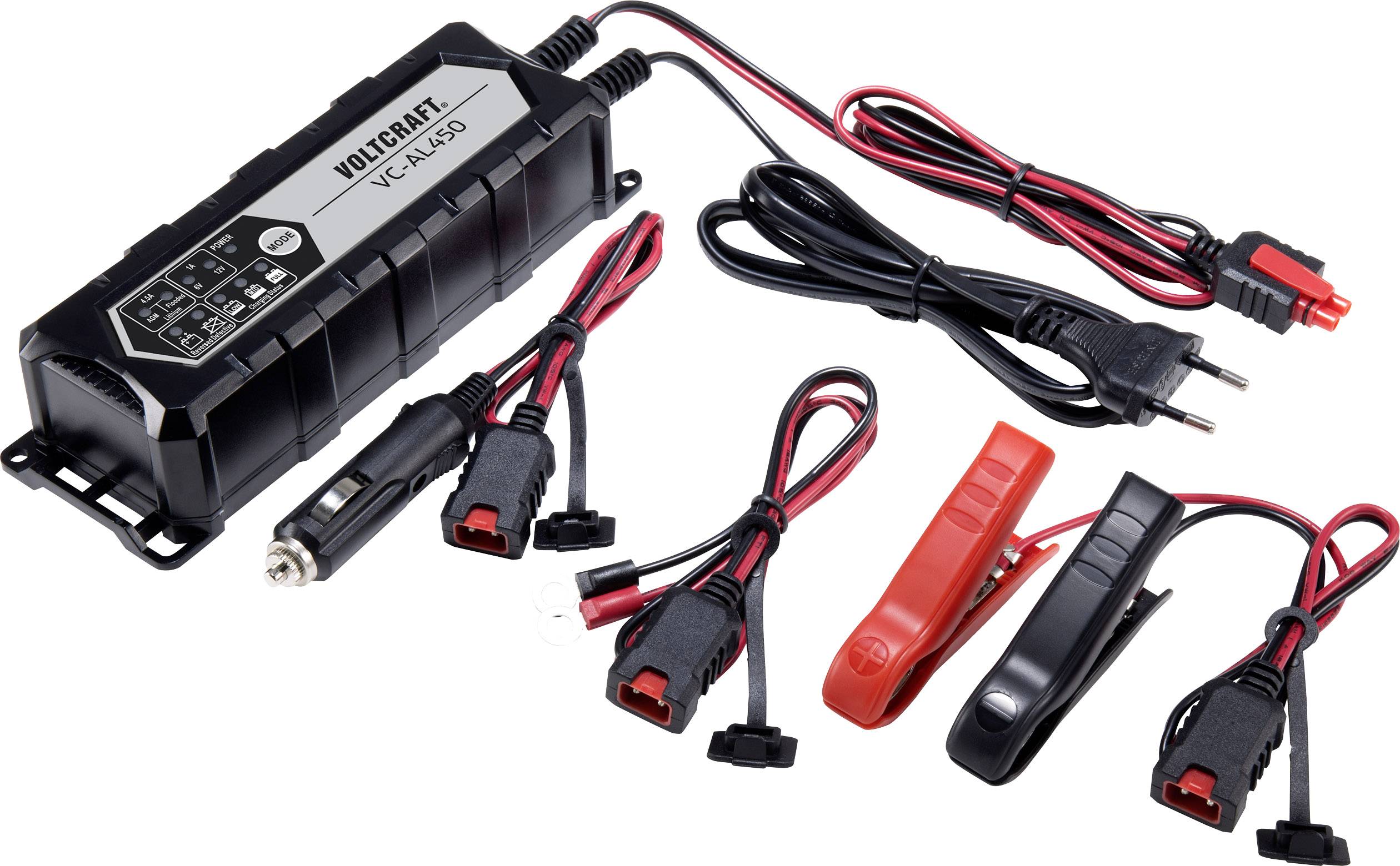 Multi-socket charger with various cable connections and terminals, suitable for charging car batteries.