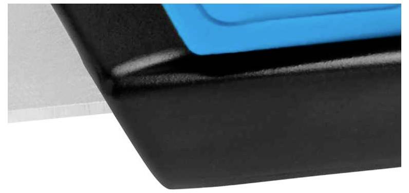 A close-up of a corner of a black and blue plastic object attached to a silver metal piece.