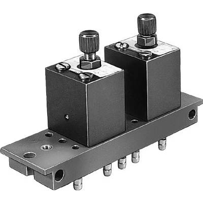 Two hydraulic valves mounted on a metal plate, visibly secured with screws, each with a rotary knob for adjustment.