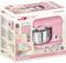 A pink food mixer by Clatronic, model KM 3711, with mixing bowl. Packaging features a retro design with a housewife in a dress.