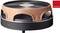 'Electric table grill with round, ribbed grilling surface. Terracotta-coloured lid in brick design. "Swiss Design" logo.'