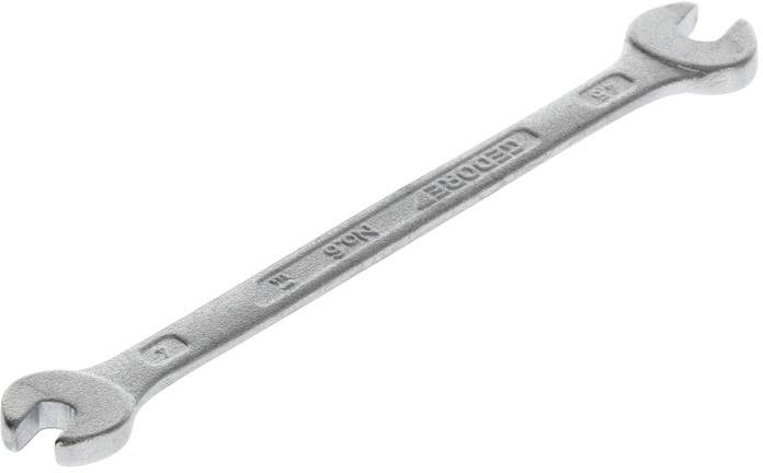 A silver double-ended spanner made of metal, with size markings for 8mm and 9mm, is lying on a white background.