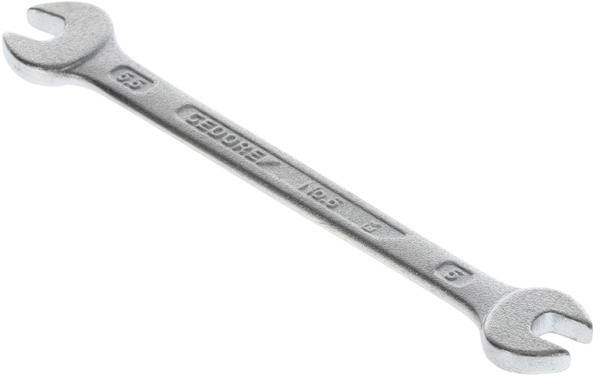 A silver double-ended spanner made of metal, with ends for sizes 6 and 5 mm.