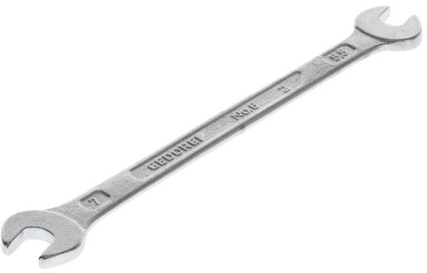 A silver double-ended spanner, lying on a white background, shows the size marking of '7 mm' at one end and '8 mm' at the other.