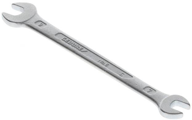 A silver adjustable spanner with two differently sized openings at the ends, size markings '5' and '6'.