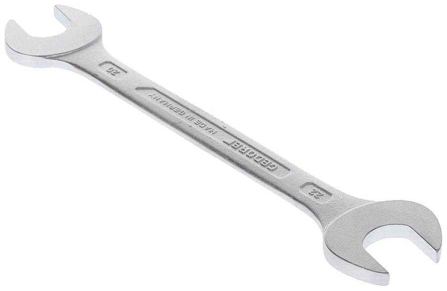 A silver metal adjustable spanner with openings of different sizes at both ends, set against a white background.