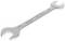 A single silver spanner with a double hexagonal end on both sides against a white background.