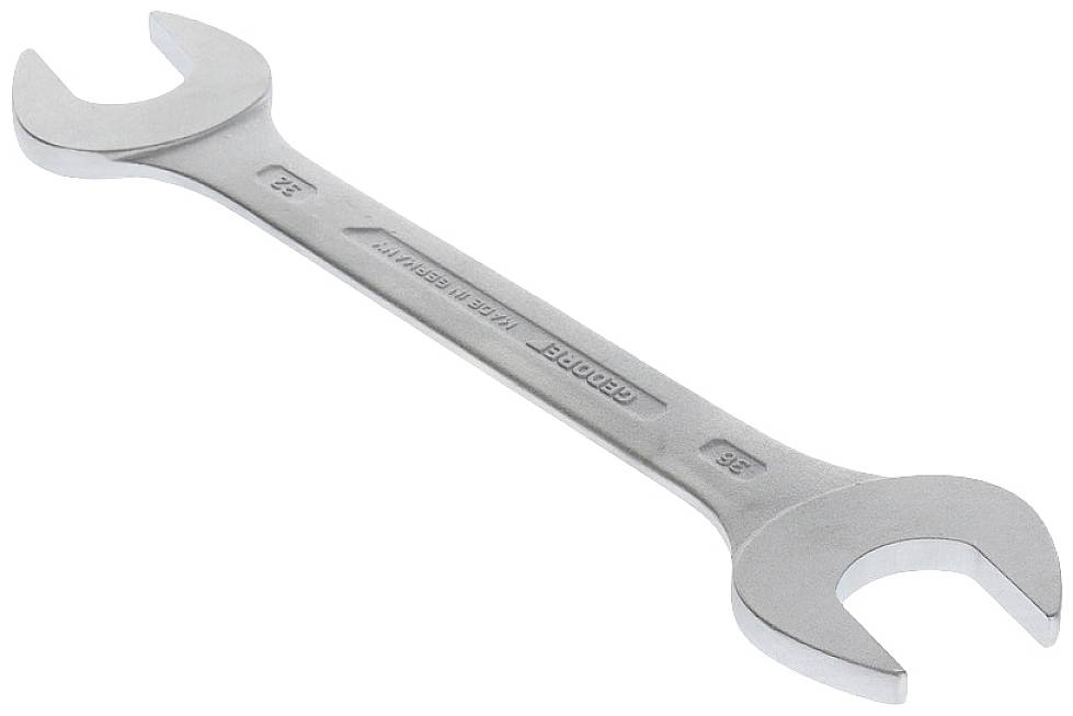 A silver double-ended spanner with size markings of 19 mm and 22 mm on both ends is lying on a white background.