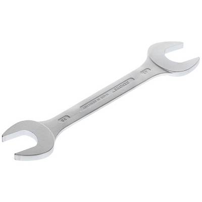 A silver double-ended spanner with open jaws, lying on a white surface.