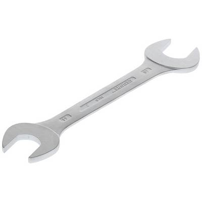 A silver-coloured spanner with two different jaw sizes at its ends, lies on a light background.