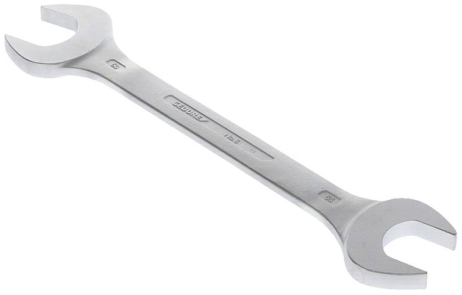 A silver spanner, double-sided, lies flat.