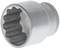 Metal socket key attachment with serrated inner surface for securing on screw heads.