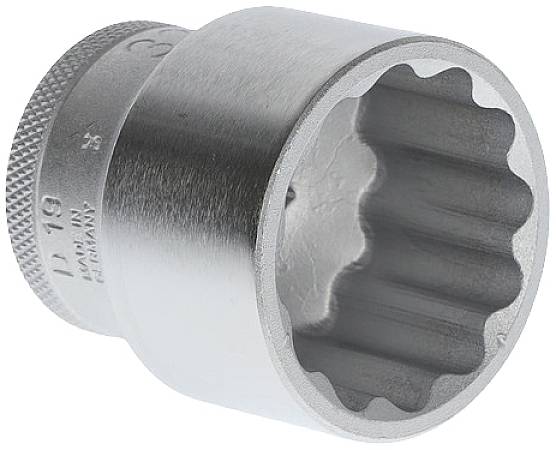 Metallic socket with knurled edge and internal tooth profile, used for gripping screw heads during repair work.