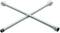 A silver cross spanner, a tool with four different socket ends, used for tightening wheel nuts.