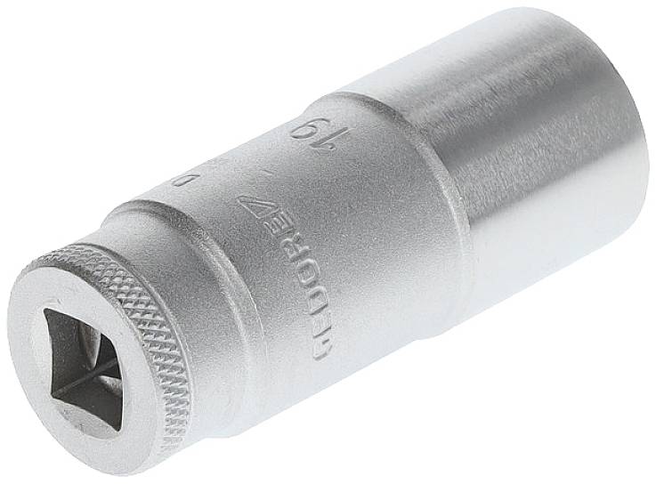 Metallic socket, silver-coloured and shiny on the outside, with a square opening at one end for socket wrenches.