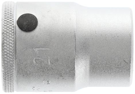 A silver metal plug with a ridged edge; a small black button is visible on the side.