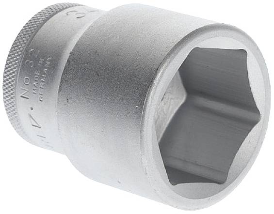 A metal socket, cylindrical with a hexagonal opening, for use with a socket wrench, on a white background.