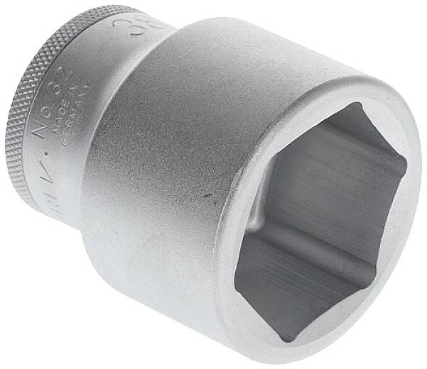 Metal hexagonal socket extension with a six-sided opening, for receiving screwnut bolts, close-up.