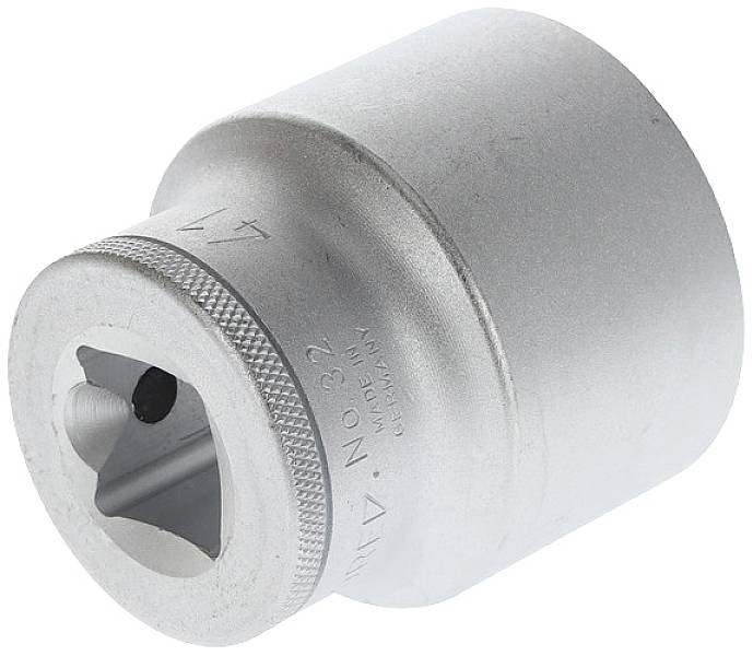 Large, silver metal nut with a square drive, marked with '32' and 'Made in Germany'. A tool used for tightening or loosening screws.