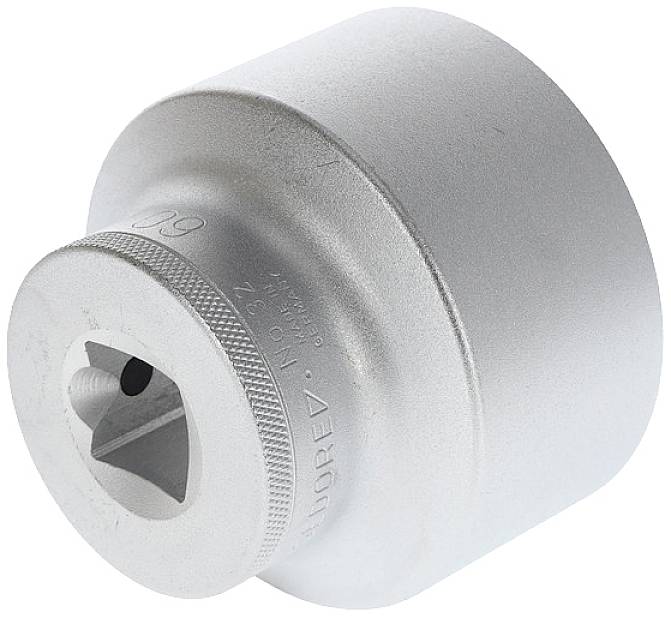 Large silver nut cap, cylindrical with a knurled edge and square opening, for use with a spanner.