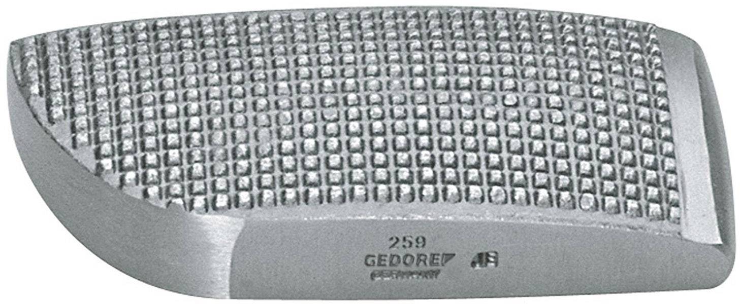 A silver metal wedge with a ribbed surface and the engraving '259 GEDORE' at the bottom.