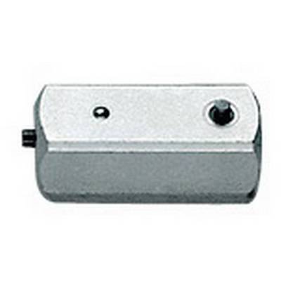 A rectangular, silver-coloured metal component with two smaller circular elements on its surface. Function unknown.