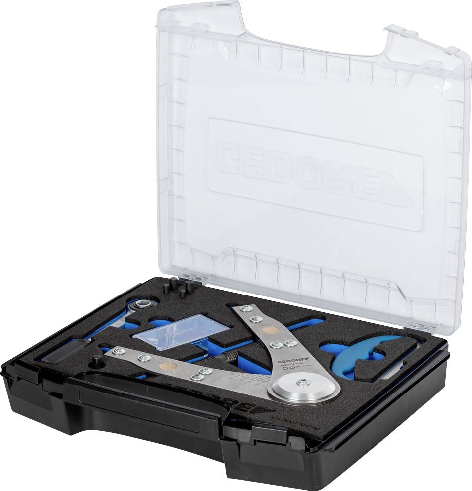 An open tool case with specialised metal and plastic tools for adjusting valve timing, securely stored in foam cut-outs.