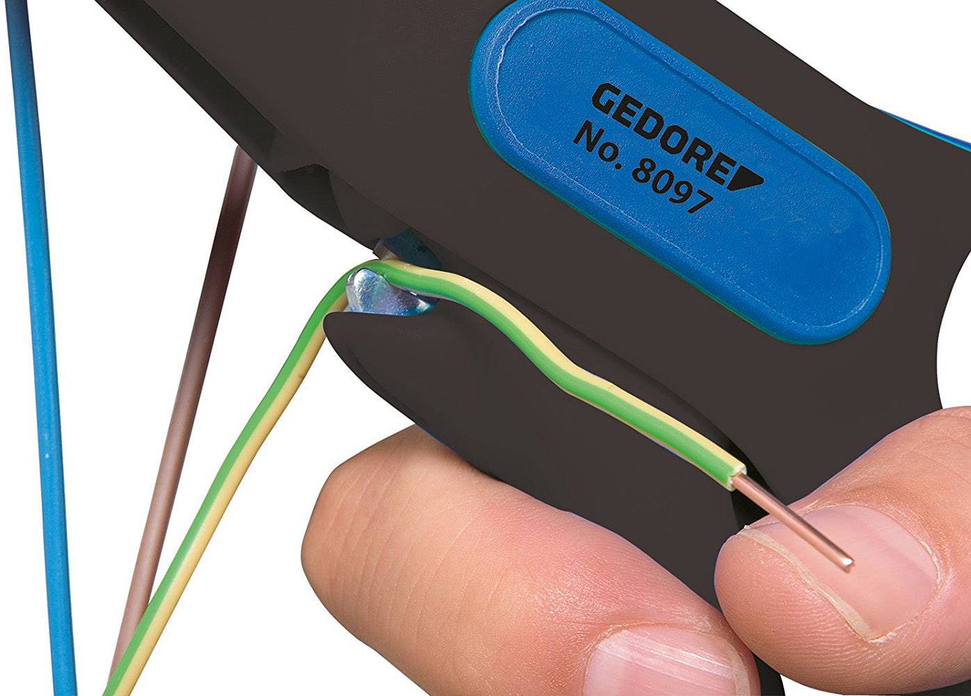 'Close-up of a person stripping a cable with a wire stripping tool. The tool is blue and black, and the cable is green and yellow.'